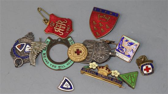A collection of World War II military and other badges, including a WWI NZ Expeditionary Force Sweetheart, made by JR Gaunt, London.